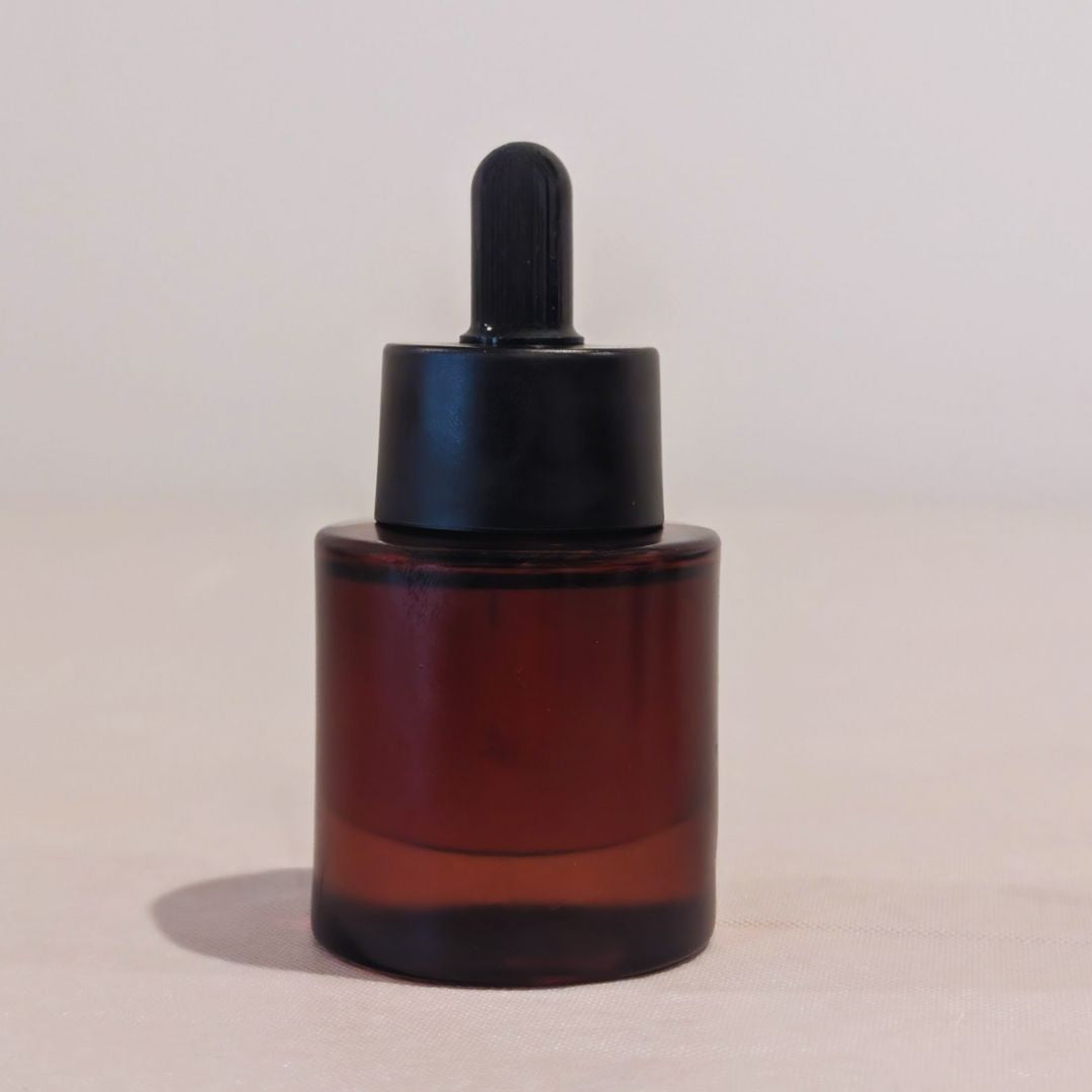 Amber glass dropper bottle 1 oz with black cap for professional private label skincare