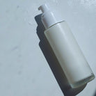 2oz Glass Pump Bottle filled with moisturizer - Ataliene Private Label Skincare
