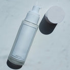 Example of 2oz Frosted Glass Bottle Labeled and Filled with Moisturizer - Ataliene Private Label