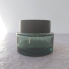 J6: Heavy Round - Green Semi-Transparent Glass Jar with Black Lid - Ataliene Skincare Private Label